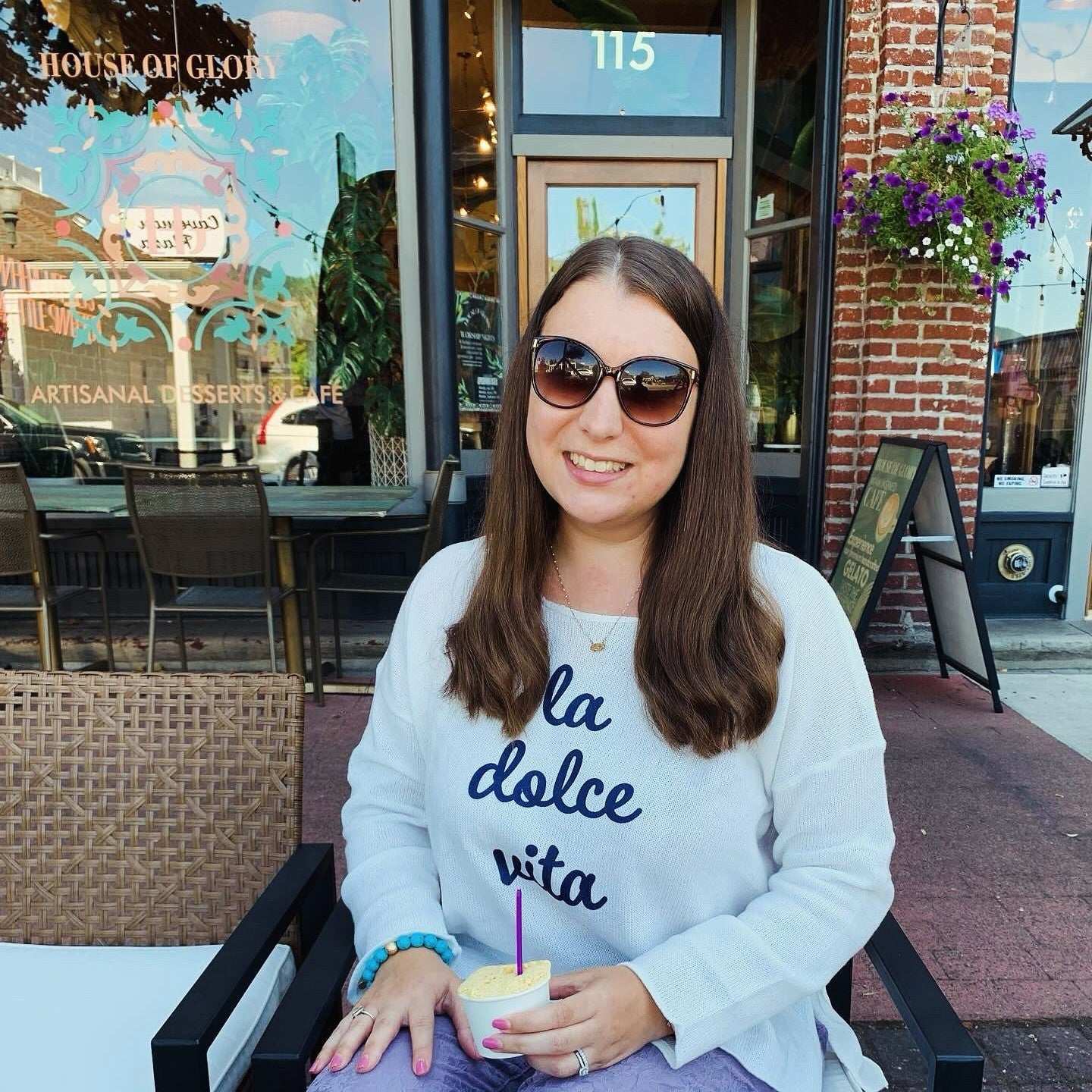 Lightweight cream-colored La Dolce Vita sweater featuring the words 'La Dolce Vita,' perfect for casual Italian flair