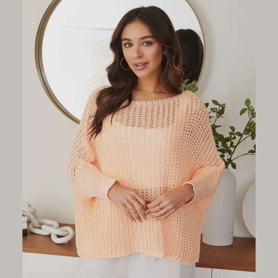 Made in Italy lightweight boatneck knit sweater with dropped shoulders, offering effortless elegance and coastal style