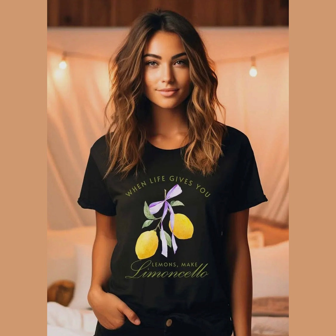 Black graphic tee featuring the words "When Life Gives You Lemons, Make Limoncello" in bold script and lemons, adding a stylish nod to Italian culture and flavor 